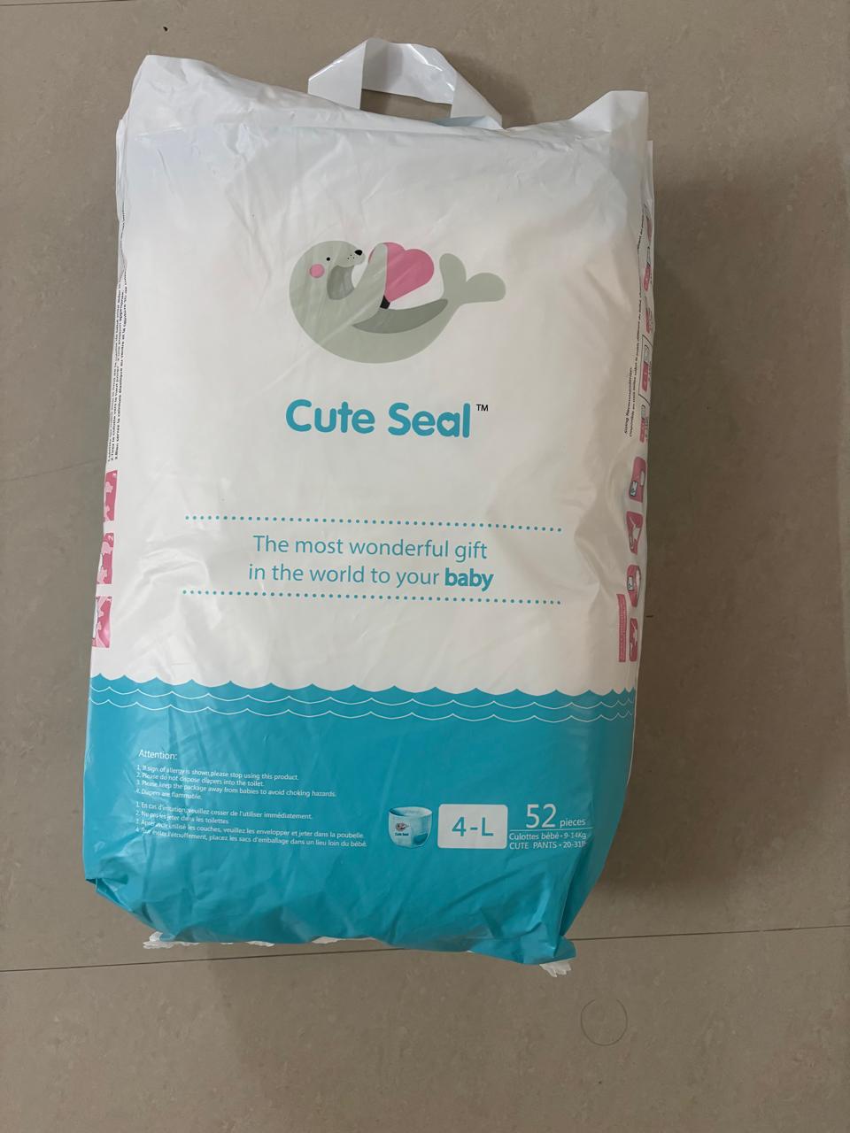 Photo 1 of 3 - Cute Seal Size -L Baby Diapers - 52 Count Pack: The Most Wonderful Gift for Your Baby's Comfort and Protection, Secure Fit, Hypoallergenic, Breathable Design for Sensitive Skin | ECOBABI® Cotton Diapers for New Borns