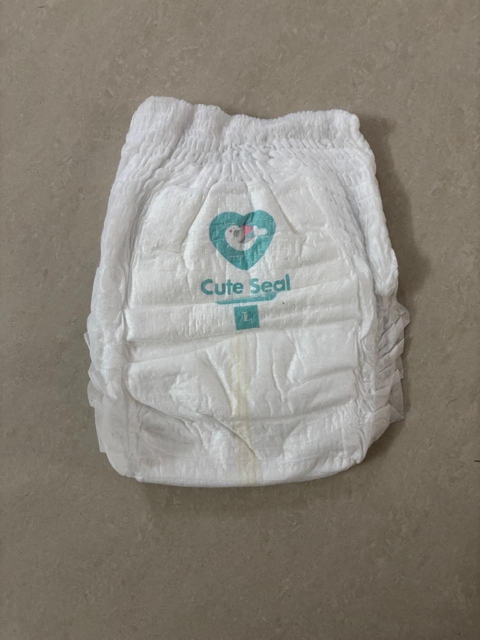 Photo 2 of 3 - Cute Seal Size -L Baby Diapers - 52 Count Pack: The Most Wonderful Gift for Your Baby's Comfort and Protection, Secure Fit, Hypoallergenic, Breathable Design for Sensitive Skin | ECOBABI® Cotton Diapers for New Borns
